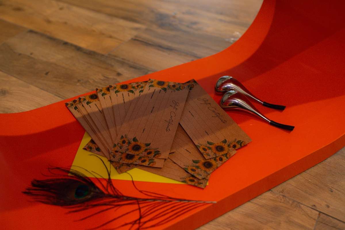 Gift vouchers next to spoons