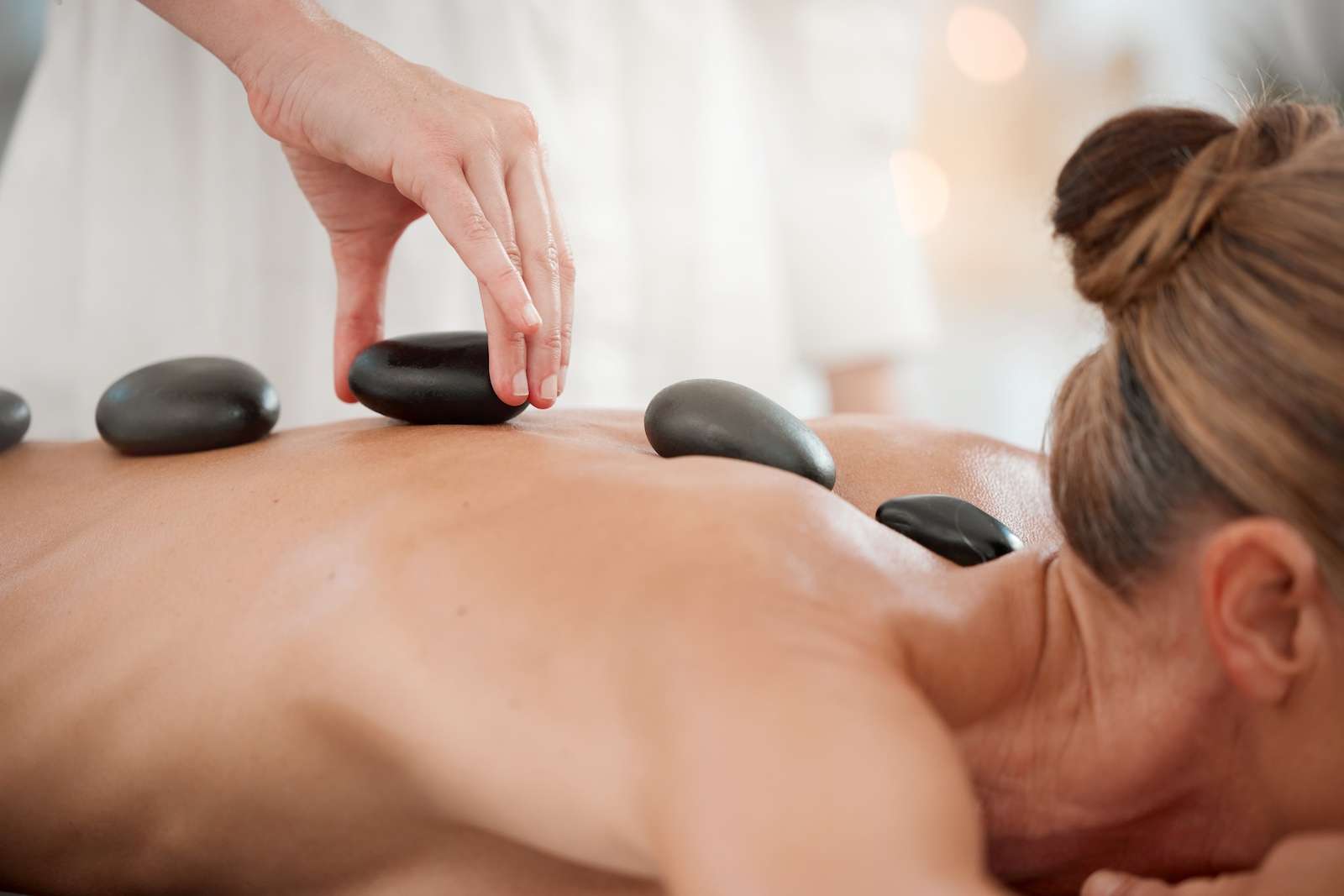 hot stone massage therapy to increase blood flow
